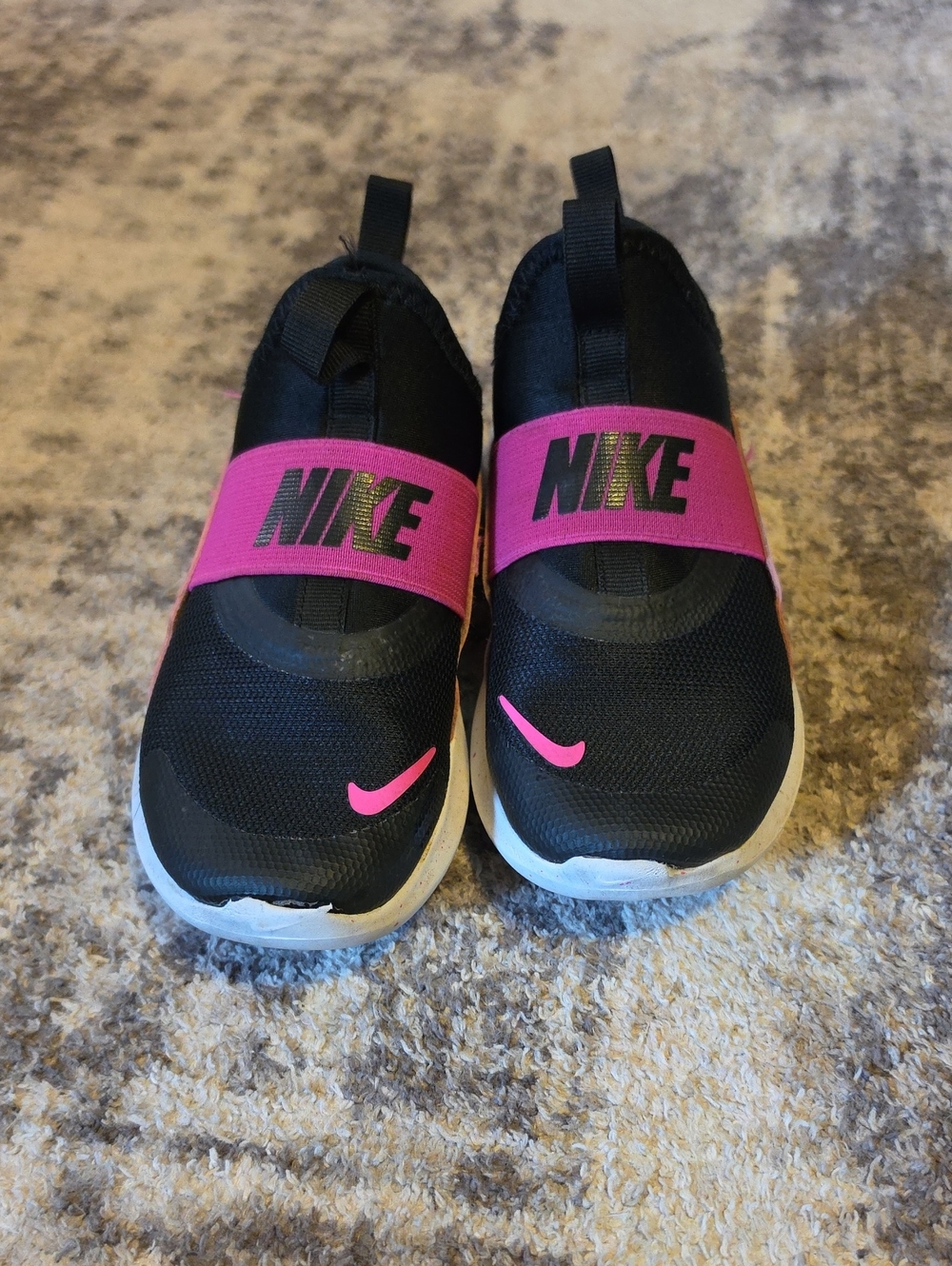 Nike Kids Slip-On Sneakers in Black and Pink